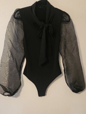 Fashion Nova Black Bow Tie-Style Bodysuit with Sheer Accents